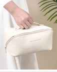 Cosmetic Storage Bag – Spacious & Portable A stylish, high-capacity organizer for your cosmetics and toiletries, ideal for travel.